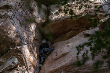 Rock Climber climbing the route Para mis amigos in Suesca Colombia
