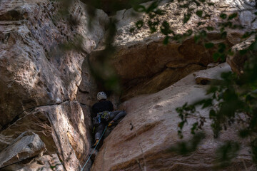Rock Climber climbing the route Para mis amigos in Suesca Colombia