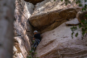 Rock Climber climbing the route Para mis amigos in Suesca Colombia