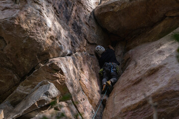 Rock Climber climbing the route Para mis amigos in Suesca Colombia