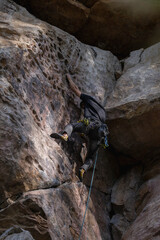 Rock Climber climbing the route Para mis amigos in Suesca Colombia