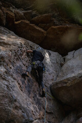 Rock Climber climbing the route Para mis amigos in Suesca Colombia