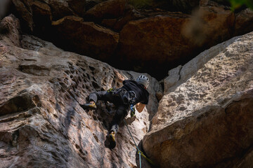 Rock Climber climbing the route Para mis amigos in Suesca Colombia