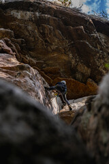 Rock Climber climbing the route Para mis amigos in Suesca Colombia