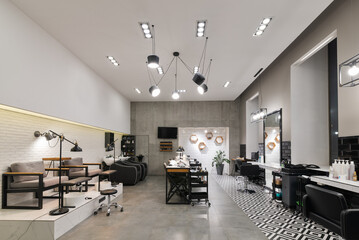 Modern interior of the beauty salon which consist of nail salon and barbershop. - obrazy, fototapety, plakaty