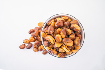 Crispy broad beans on white background