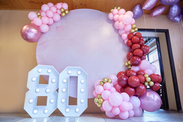 Celebrating Photo zone of balloons for the 80th anniversary. Example of a birthday decor. Close-up.