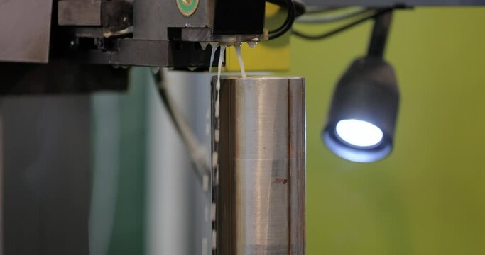 EDM CNC machine while cutting the sample work pieces. Cutting metal modern processing technology Making Industrial Details.