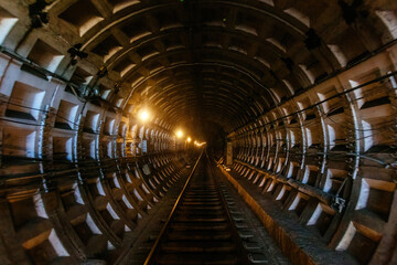 Inside round underground subway tunnel