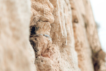 Note stuck in stone, wall