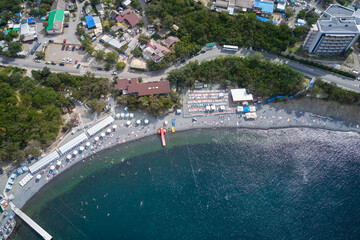 The coastline of the resort village of the beach infrastructure and the purest aquamarine water....