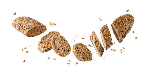 Fresh baked sliced multi grain baguette with poppy, sunflower, sesame seeds flying isolated on white background.