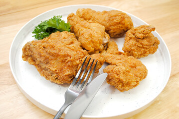 Eating Southern Fried Chicken Pieces 