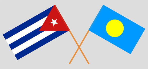 Crossed flags of Cuba and Palau. Official colors. Correct proportion
