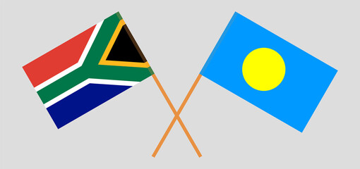 Crossed flags of South Africa and Palau. Official colors. Correct proportion