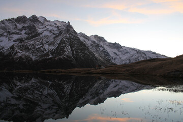 Pontet lake in the french Alps with view on La Ecrins mountains