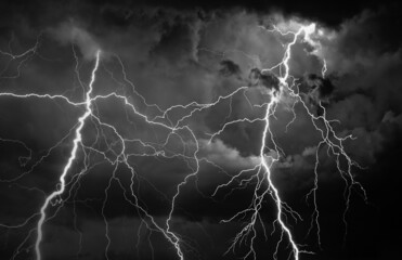 Thunder, lightnings and rain at night during summer storm.