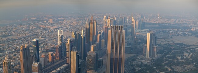 Panorama of buildings and fountains in the city of Dubai from the Burj Khalifa, the tallest...