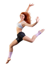She loves to dance. Young dancer jumping against a white background.