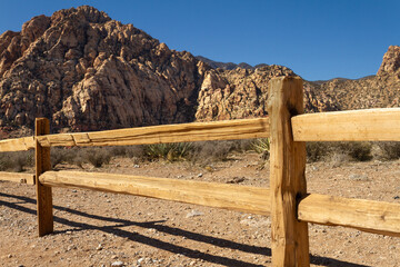 Old western style wooden fence in a Nevada desert landscape