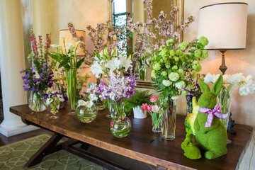 Table of spring flowers in vases