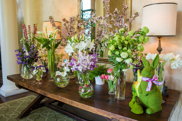 Table of spring flowers in vases