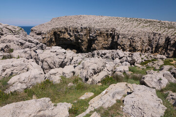 Fototapeta na wymiar Cliffs of Suances, Cantabria. La Roca Blanca. Limestone. Geology 