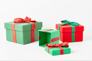 Present. Gift box with a bow. New Year's surprise. Red and green box with a gift