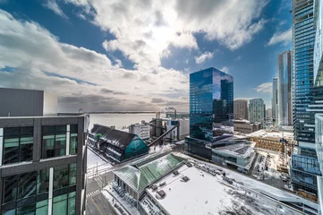 Fotobehang Lower Jarvis  downtown Toronto aerial views ok condos business and lake shore in the winter time right after snow storm in  February  © contentzilla