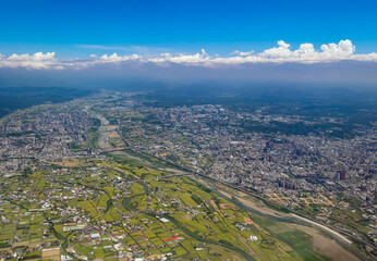 Fototapeta premium Sunny aerial view of the Hsinchu City