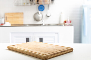 empty wooden chopping block, placed on a table, retro kitchen background / area for you to edit the product