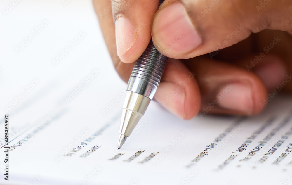 Poster Make sure you get insured. Shot of an unrecognisable businessman filling in a form on a desk in an office.
