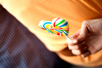 person holding a lollipop