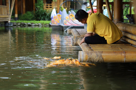 Fish Feed Pellets Float In Water. Fishing Industry For Local Consumption