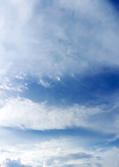 Naklejka na ściany i meble Colorful vertical sky with cloud on a sunny day.