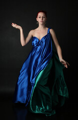  Full length portrait of pretty female model wearing  grecian goddess  toga gown, posing with...