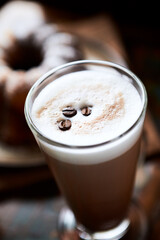 Coffee with milk on dark  background. Close up.	