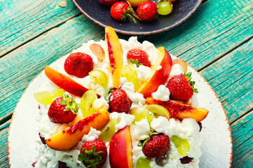 Colorful cake with watermelon and berries.