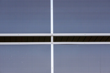 Metal fence installed on the exterior wall of the building