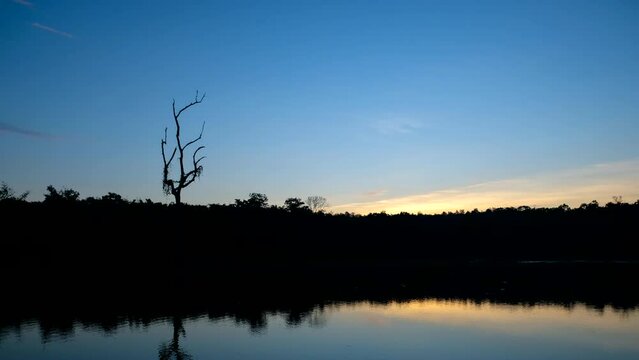 Beautiful dawn scenic sunrise in the morning with reflection on the lake 4K ProRes UHQ Timelapse