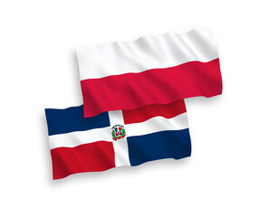 National vector fabric wave flags of Dominican Republic and Poland isolated on white background. 1 to 2 proportion.