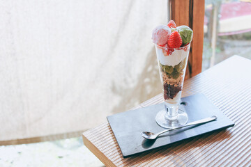  Parfait of strawberry and matcha in the cafe.
