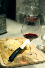 Pasta bolognese with a glass of pinotage red wine. Wine from the Pinotage grape variety. Italian cuisine at home. Dishes of Italian cuisine with your own hands.