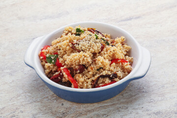 Arabic cous cous with meat and tomato