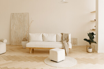 Stylish living room with white and beige furniture. Modern minimalistic interior.
