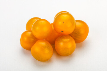 Fresh yellow cherry tomato heap