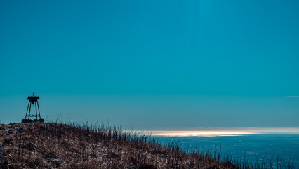 The plain and the sea from the alpine peak