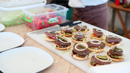 Homemade little burgers with grilled meatballs