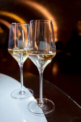 Tasting of brut champagne sparkling wine produced by traditional method in underground caves