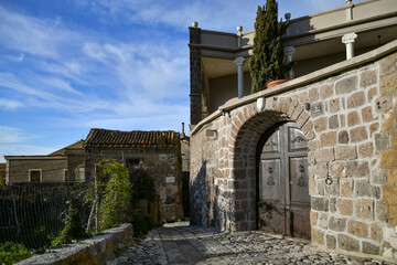 A narrow street among the old stone houses of the oldest district of the city of Caserta.